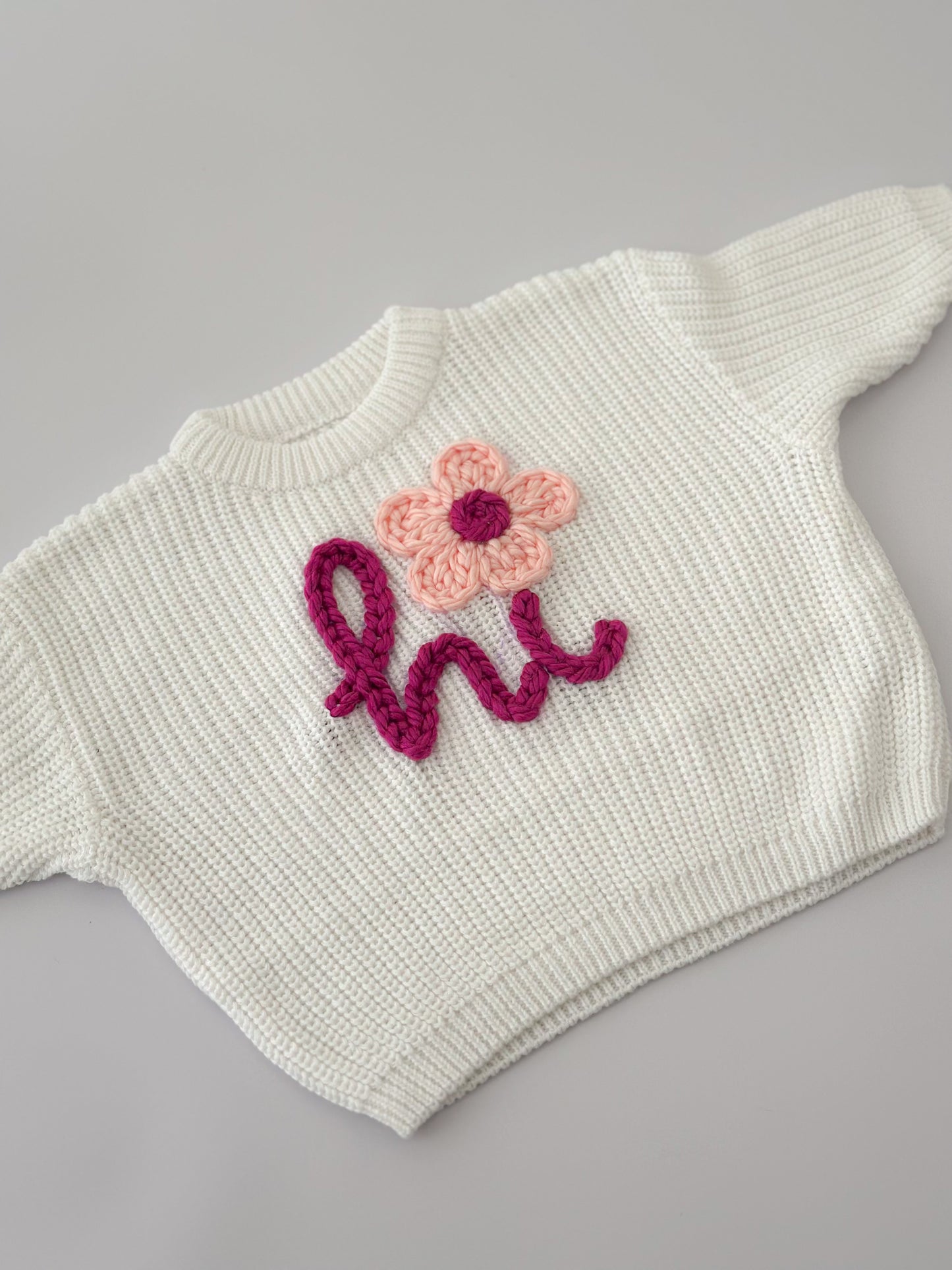 'Hi' sweater